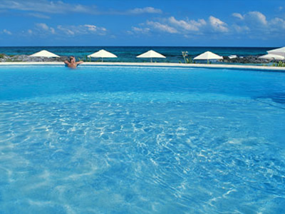Hotel Playa Media Luna, Hoteles Pequeños en Isla Mujeres